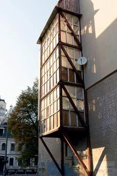 Facade of the two-storey white brick building Stock Photos