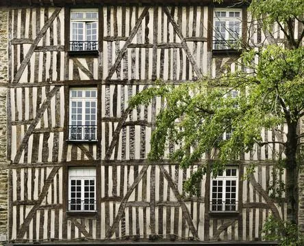 Facade of a typical medieval half-timbered house. Stock Photos