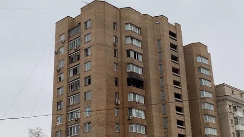 Facade of a typical panel residential building after a major fire Stock Footage 103580028