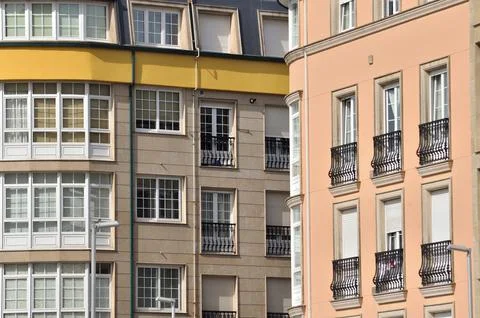 Facades of two buildings forming parallel and perpendicular lines Stock Photos
