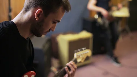 Face and Hand of an Electric Guitar Player Stock Footage 72192911