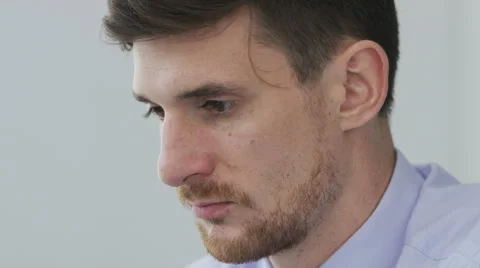 Face and hands of a businessman working with a laptop computer Stock Footage 68402735