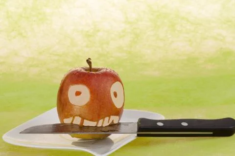 Face in the apple Stock Photos