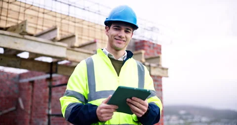 Face, architect and happy man with tablet at construction site, development and Stock Footage 337026255