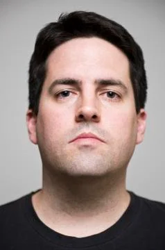 The face of an arrogant man Stock Photos