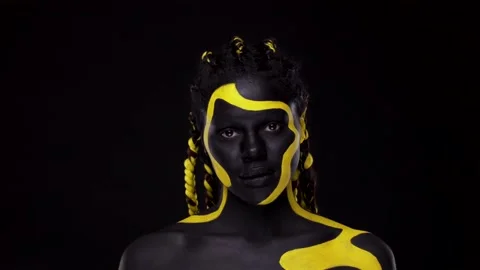 Face Art Woman With Black And Yellow Body Paint Young African Girl