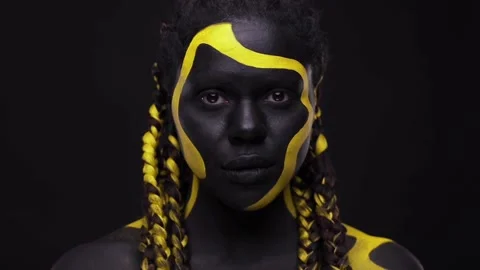 Face Art Woman With Black And Yellow Body Paint Young African Girl