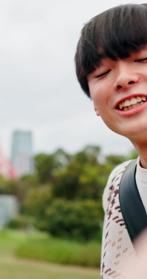 Face, Asian man and talking in city for live streaming, recording video and Stock Footage 341074005