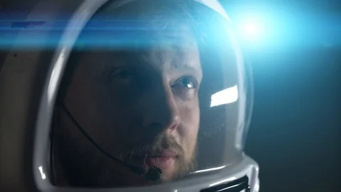 The face of the astronaut in the helmet close-up Stock Footage 107925234