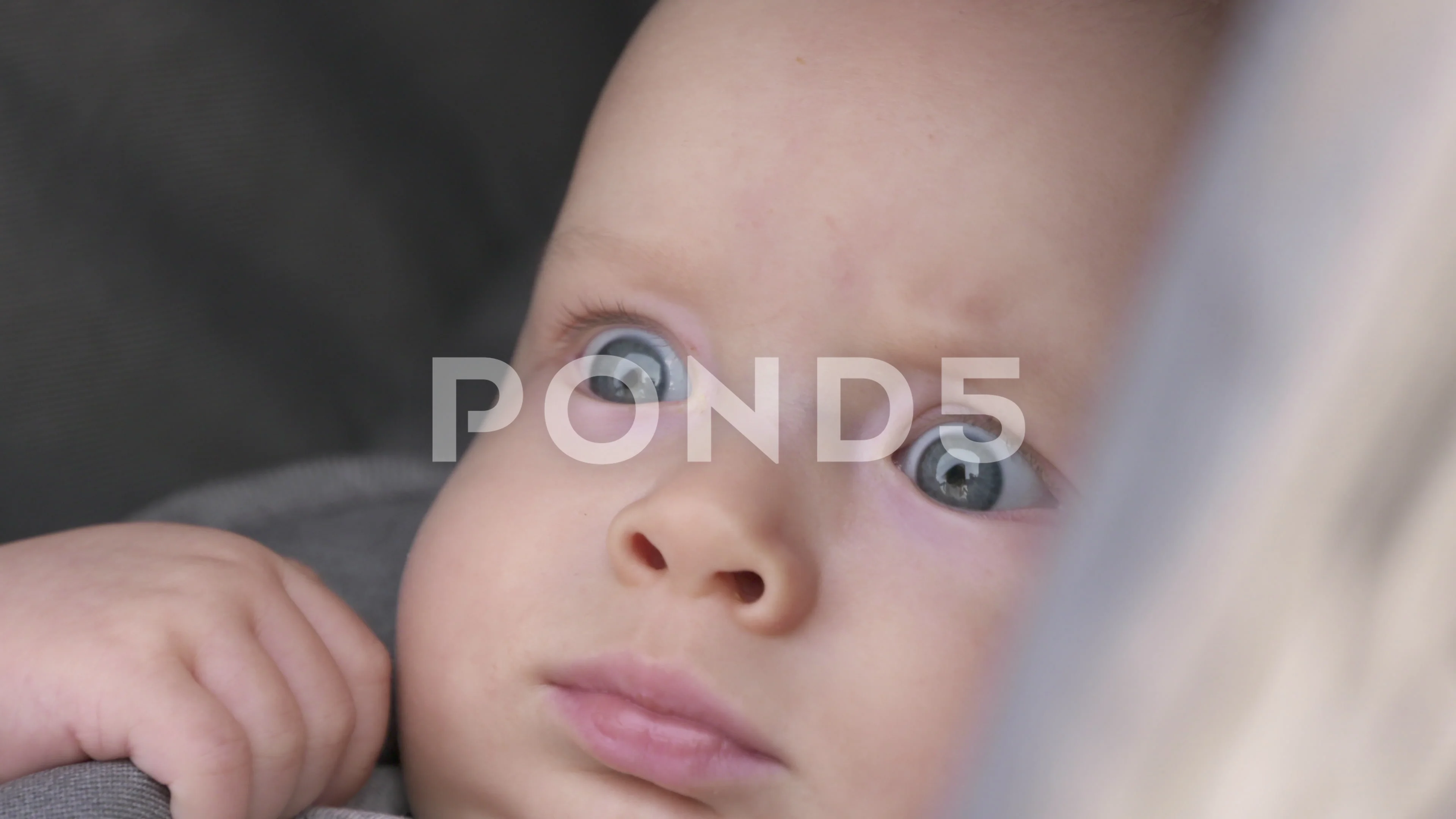 Face Of Baby Boy Sitting In Baby Strolle Stock Video Pond5