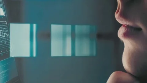 The face on the background of the display with computer graphics Stock Footage 81457560