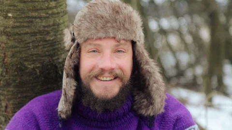 The face of a bearded emotional man in winter. Stock Footage 59660180