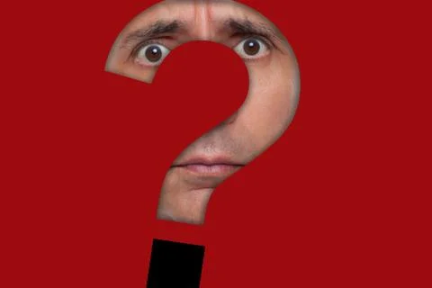 Face behind a question mark paper cut out Stock Photos