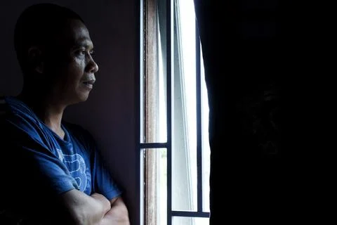 The face behind the window Stockfoto's