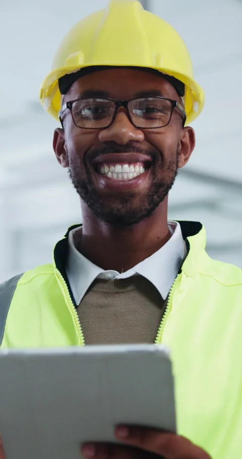 Face, black man and engineer in office with tablet, research and schedule for Stock Footage 341379766