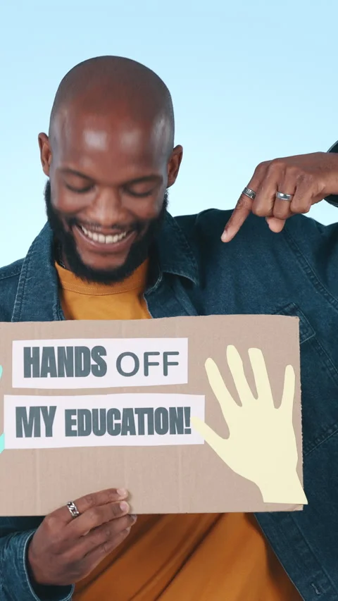 Face, black man and poster for protest, pointing and hands off my education on Stock Footage 331840644