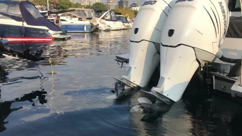 Face boat engine exit from the water Stock Footage 144342011