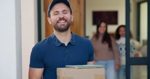 Face, box and smile with delivery man at front door for shipping, tablet or Stock Footage 335798254