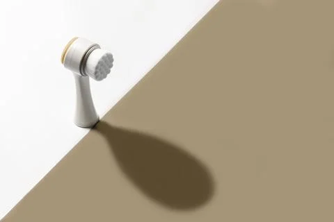 Face brush with its own shadow. Stock Photos