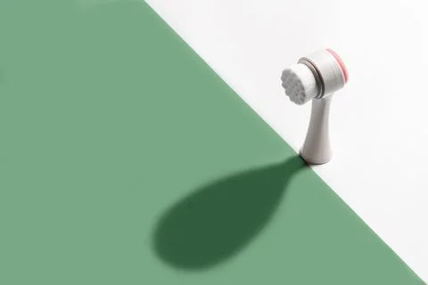 Face brush with its own shadow. Stock Photos