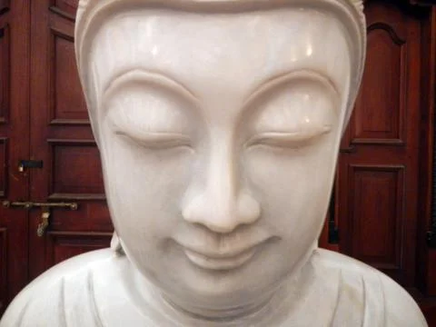 Face of Buddha statue Stock Photos