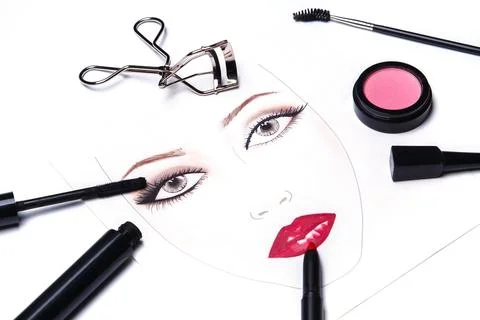 Face chart and different makeup objects and cosmetics Stock Photos