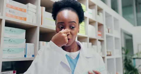 Face, chemist and medicine in pharmacy with video call, explain sinus relief Stock Footage 343845006