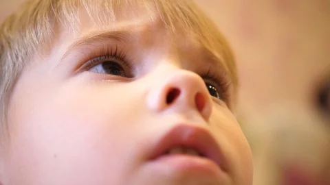 The face child close-upthe face of a small child close-up 動画素材 94176341