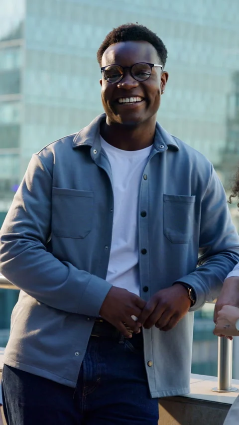 Face, city or black man with smile on balcony, property development industry or Stock Footage 333682477