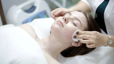 Face cleaning with cotton balls Stock Footage 74360324