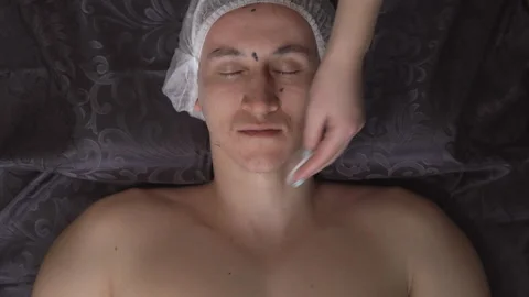 Face cleaning. Man in spa salon on procedure Stock Footage 86154739