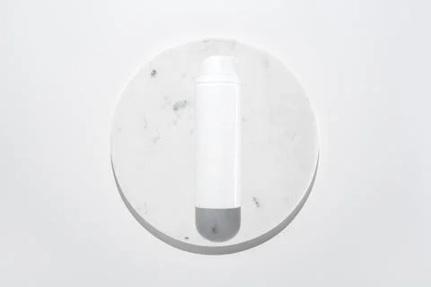 Face cleanser foam on marble circle white background Foto stock