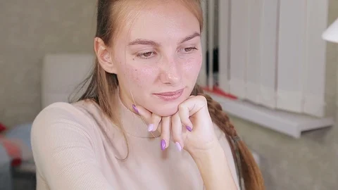 The face of a client of a beauty salon during a manicure gel polish procedure. Vidéo 119440346