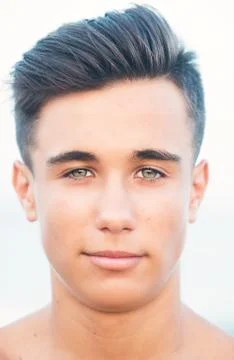 Face close-up of a handsome young guy Stock Photos