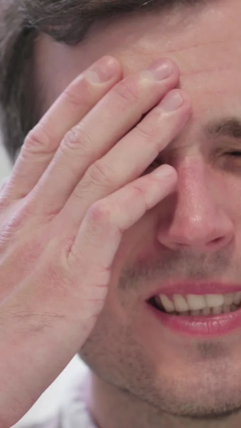 Face Close Up of Man Having Headache, Vertical Video Stock Footage 337350868