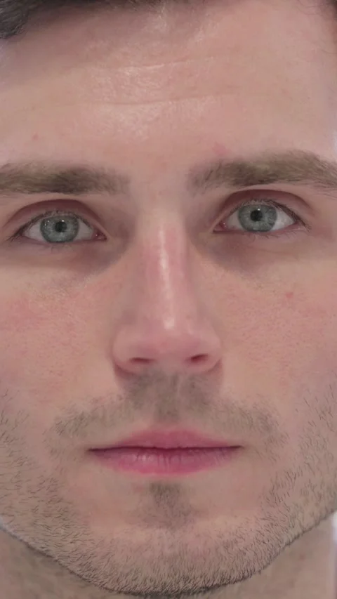 Face Close Up of Man Looking at the Camera, Vertical Video Stock Footage 337350792