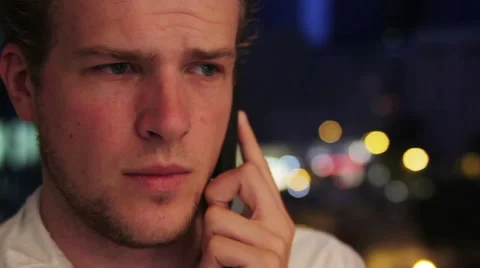 Face close-up of man talking on the phone Stock Footage 40698915