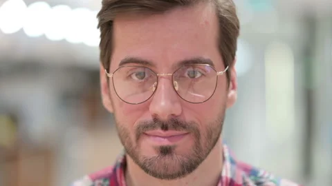 Face Close up of Serious Young Man Stock Footage 139694788