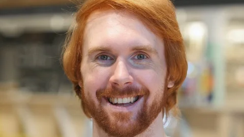 Face Close Up of Smiling Redhead Beard Man Looking at Camera Stock Footage 87008277