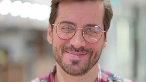 Face Close up of Smiling Young Man Video stock 139695783