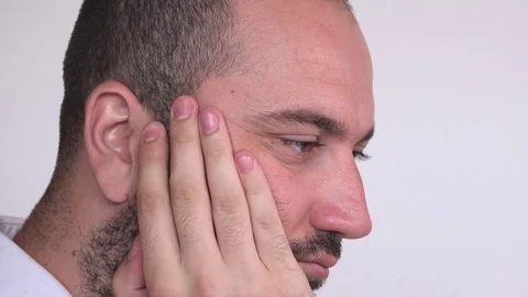 Face close up stressed overworked depressed business man thinking finance issues Stock Footage