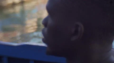 Face close-up while sitting on a boat Видео 67522030