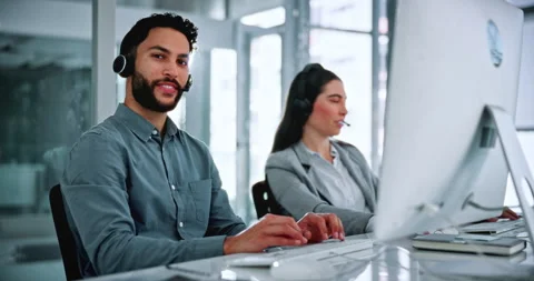 Face, computer and businessman with headset in call center, laughing and Stock Footage 336306151