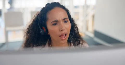 Face, computer and surprise with a call center woman in customer service or 스톡 사진