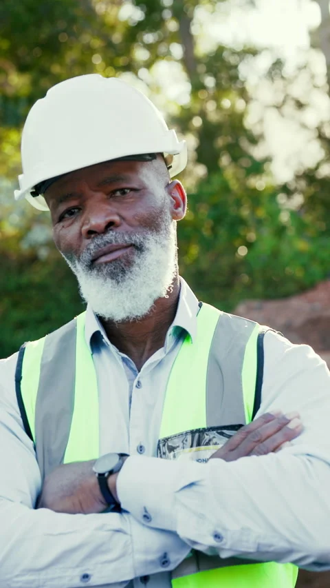 Face, contractor and man with confidence at construction site, building Stock Footage 340450055