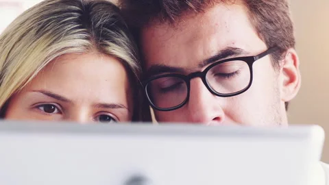 Face of couple, tablet or reading bad news, entertainment or social media with Stock Footage 262666720