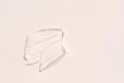 Face cream texture on white surface Stock Photos