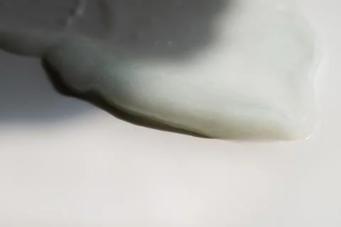 Face cream texture on white surface Stock Photos