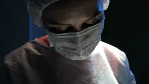 The face of the doctor focused on the operation Video stock 94598871