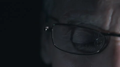 Face of an elderly man with glasses close up Stock Footage 144582483